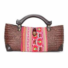 Wood Handle Sedge Bag With Vintage Hmong Fabric Fair Trade Made. 14" X 7" Handcrafted In Thailand, This Beautiful Bag Features Wooden Handles, A Zipper Top And For Your Convenience, An Inside Zipper Pocket. Woven Weave From Sedge(Plant). Full Lining You Will Receive One Similar To The First Photo In Terms Of Color Which Is The Mocha With The Floral Fabric Design. Since Each Bag Is Handcrafted, Designs May Differ Just Slightly. Traditional Woven Top Handle Bag, Traditional Top Handle Woven Bag, Bohemian Brown Straw Bag With Handles, Traditional Top Handle Straw Bag, Brown Rectangular Bag With Weaving Work, Traditional Pink Woven Bag, Red Bohemian Straw Bag Rectangular, Bohemian Red Rectangular Straw Bag, Red Bohemian Rectangular Straw Bag