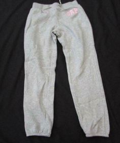 GAP kids girls lrg 10 light gray heather fleece sweatpants logo elastic bottom X gray heather fleece sweatpants for girls by GAP kids Click to Enlarge X X applique logo on left hip Click to Enlarge cinched at bottom with elastic Click to Enlarge Fabulous sweatpants for girls by Gap kids light gray heather fleece elastic waist and bottoms cotton/poly blend appliqued logo on left hip in pink and white  size girls large (10/11) very good condition with no holes, rips, stains, or tears NA bin 1 Kids Light, Fleece Sweatpants, Kids Lighting, Gap Kids, Pink And White, Light Gray, Heathers, For Girls, Light Grey