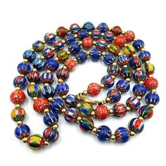 "This stunning strand of vintage Venetian trade style beads is a must-have for any collector. The beautiful red chevron design adds a pop of color to any jewelry project or home decor display. These beads are handmade with exquisite glass material, showcasing the craftsmanship and attention to detail from artisans of the time period. The origin of these beads is African, adding to their unique and cultural value. These collectible beads are classified under the categories of 1950-Now, Beads, and Collectibles. The strand is perfect for adding a touch of vintage charm to any project or for displaying in a collection. Don't miss out on the opportunity to own these beautifully crafted beads from a bygone era.  * Stunning Old Chevron Beads SIX Layer   * Full Strand 26\" Inches Chevron Beads.  * Vintage Polished Beads For Festive Occasions, Vintage Multicolor Spacer Beads, Vintage Multicolor Large Beads, Vintage Colorful Beaded Necklaces For Festive Occasions, Vintage Large Beads For Festive Occasions, Traditional Multicolor 8mm Beads Jewelry, Traditional Multicolor 8mm Beaded Jewelry, Traditional Multicolor 8mm Bead Jewelry, Traditional Multicolor 8mm Beaded Necklaces