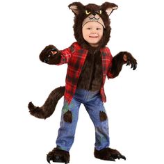 a little boy in a costume that looks like a cat with big eyes and claws