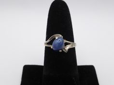 Elevate your jewelry collection with this stunning Blue Lindy Star Sapphire ring, expertly crafted in 14K solid white gold. This vintage piece boasts a captivating star sapphire, renowned for its unique asterism that catches the light beautifully. The deep blue hue of the sapphire contrasts elegantly with the gleaming white gold band, creating a timeless piece that exudes sophistication and charm. Perfect for special occasions or as a statement piece for everyday wear, this ring combines classic Star Sapphire Ring, Star Sapphire, White Gold Band, Vintage Ring, Gold Band, Rings Statement, Vintage Charms, Deep Blue, Timeless Pieces