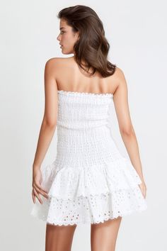 Look charming in this elastic, sleeveless mini dress. Its intricate embroidery, strapless silhouette, and playful ruffles make it perfect for special occasions. With its stretchy fabric, it promises a comfortable and flattering fit.Fabric: Cotton, Polyester Long Drop Earrings, Intricate Embroidery, Sleeveless Mini Dress, Silver Drop Earrings, White Mini Dress, Trending Now, Gold Earrings Studs, Stretchy Fabric, Fabric Cotton