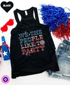 "Looking for a stylish and patriotic shirt to show off your American pride on the 4th of July or during the summer? Check out our July 4th shirt! This shirt is red, white, and blue and features the phrase \"We the People Like to Party\" in a distressed lettering. Perfect for Independence Day, this shirt is sure to get you in the patriotic spirit! Features: -Sideseamed -Relaxed, drapy fit -Merrowed bottom hem -Sheering at racerback seam" Patriotic American Flag Tank Top For Summer, Black Tops With American Flag Print For Summer, Black Summer Top With American Flag Print, Patriotic T-shirt With American Flag Print For Summer, American Flag Print Top For Fourth Of July, Summer Patriotic T-shirt With American Flag Print, Patriotic American Flag T-shirt For Summer, Patriotic Pre-shrunk Shirt For 4th Of July, Black Tops With Flag Print For Summer