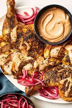 grilled chicken, radishes and carrots on a plate with dipping sauce