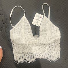 Crop Bra Top With Lace & Beaded Detail Trendy Lace Crop Top For Party, Casual Lace Crop Top For Parties, White Lace Crop Top For Night Out, Trendy White Lace Crop Top, Sleeveless Lace Crop Top With Built-in Bra, White Lace Crop Top With Built-in Bra, Lace Stretch Crop Top With Built-in Bra, Crop Bra, Crop Top Bra