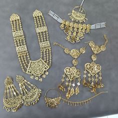 This Is Beautiful Punjabi Jadau Necklace With Gold Plated Earings For Women And Girls | Gold Plated And Pearl Jewellery | Sangeet Jewellery | Punjabi Jewellery | Nikah Jewellery | Indian Wedding / Gold Plated Set / One Gram Gold Set / Gold Necklace Set Made With Gold Plated , Pearls , Beads , Pipal Patti . Thank You :) Punjabi Wedding Jewelry Sets, Silver Bridal Sets For Diwali Celebration, Gold Filigree Bollywood Jewelry, Gold Bollywood Style Filigree Jewelry, Traditional Kundan Jewelry With Filigree Details, Traditional Kundan Jewelry With Filigree, Gold Temple Jewelry Tikka As Gift, Kundan Filigree Yellow Gold Jewelry, Traditional Jewelry With Stone Work For Gifts