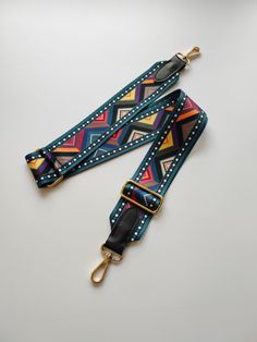 You can use our wide woven removable long bag strap for any bag, camera or phone case you want.  It is a printed polyester woven strap. We offer 3 different sizes: Adjustable : 125 cm  x W 3.8-4 cm Size  1 :  90 cm x W 3.8-4 cm Size  2 :  115 cm x W 3.8-4 cm We offer gold and anthracite colors for the metal accessories. Please message us for your choices. 👜 For more of ValentElle straps / Pour plus de sacs ValentElle : https://www.etsy.com/fr/shop/ValentElle?section_id=41534341 Long Strap Crossbody Bag Strap As Fashion Accessory, Adjustable Multicolor Crossbody Shoulder Strap, Multicolor Crossbody Shoulder Strap For Everyday Use, Trendy Crossbody Bag Strap As Fashion Accessory, Adjustable Logo Strap Crossbody, Trendy Adjustable Crossbody Shoulder Strap, Logo Strap Crossbody Bag Strap For Daily Use, Adjustable Logo Crossbody Shoulder Strap, Daily Use Crossbody Bag Strap With Logo