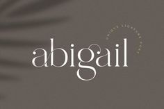 the word abigal is written in white on a brown background