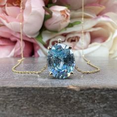 "The pendant pictured is a simulated diamond aquamarine #7082 The chain is non removable -Approximate total carat weight: approx. 3.00ctw diamond equivalent -Center Stone Size: 10x8mm - approx. 3.00ct diamond equivalent -Center Stone Shape: oval -Gem Type: simulated diamond -Stone Clarity: VVS1 -Stone Color: aquamarine / light blue -Moh's Scale: 8.5 hardness -Metal Type and Purity: 14k white gold -Setting: 4 prong basket head -Chain: 18\" delicate 14k gold chain / heavier option with lobster cla Solitaire Necklace, Aquamarine Pendant, Simple Diamonds, Head Chain, White Gold Set, Solitaire Necklaces, March Birthstone, Oval Pendant, Keep Jewelry