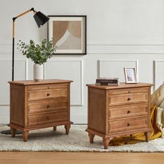 two wooden nightstands sitting on top of a white rug