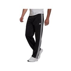 Track pants are an activewear staple. Gear up and conquer your busy life in these men's adidas pants. All about ease and comfort, these adidas pants are a men's activewear essential. Track pants are an activewear staple. Gear up and conquer your busy life in these men's adidas pants. All about ease and comfort, these adidas pants are a men's activewear essential. Moisture-wicking 3 stripes along both legs 2-pocketFIT & SIZING Regular, relaxed fit 30-in. inseam Drawstring elastic waistbandFABRIC & CARE 100% recycled polyester Machine wash Imported Color: Black. Gender: male. Age Group: adult. Material: Fleece. Men's Activewear, Adidas Pants, Busy Life, Mens Activewear, Adidas Men, Track Pants, Mens Pants, Moisture Wicking, Age Group