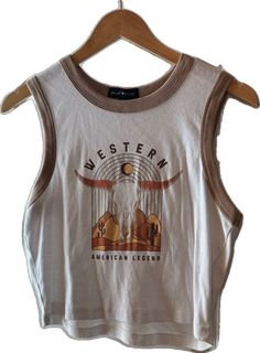 Trendy Sleeveless Brown Top, Trendy Brown Summer Vest, Trendy Brown Vest For Summer, Casual Graphic Print Cami Tank Top, Casual Brown Sleeveless Crop Top, Brown Crew Neck Tank Top For Summer, Summer Brown Crew Neck Tank Top, Brown Vest Top For Summer, Brown Summer Vest Top