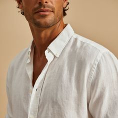 Features of the WHITE Classic Linen Shirt CLOUD: Crafted from 100% pure European linen for a lightweight, breathable, and durable shirt. Custom-tailored with customizable pocket options. Choose from different button options. Versatile classic white shirt suitable for formal occasions and vacations. Made with premium European linen, ensuring superior quality and comfort. Custom size measurements available for a perfect fit. Upgrade your wardrobe with this must-have White linen shirt. Check out ou White Linen Shirt With Button Cuffs, White Button-up Dress Shirt With Pockets, White Shirt With Pockets And Casual Collar, White Summer Shirt With Button Cuffs, White Casual Dress Shirt With Button Closure, Casual Summer Dress Shirt With Button Cuffs, Casual White Collared Dress Shirt, White Unstructured Button-up Top, Unstructured White Button-up Top