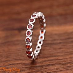 Solid 925 Sterling Silver 3mm Dainty January Birthstone Red Garnet Color CZ Bezel Set Full Eternity Band Bubble Stackable Ring Size 5-10 ▷Gift Box Included ▷3mm Height ▷Size 5-10 Available ▷925 Sterling Silver (not plated or filled) ▷925 Stamp Authenticity ▷High-Quality Cubic Zirconia Used https://www.etsy.com/shop/TrendyRing Elegant Red Eternity Band As A Gift, Red Cubic Zirconia Round Band Jewelry, Red Garnet Round Band Jewelry, Red Round Eternity Band As Gift, Red Eternity Band Gift, Red Ruby Round Eternity Band, Red Garnet Stackable Jewelry, Red Round Eternity Band For Anniversary, Red Stackable Rings With Bezel Setting As Gift