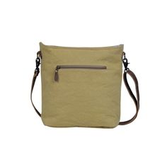 "Fragrant Yellow Shoulder Bag Recycled from a unique rug design, the yellow hues will remind you of a beautiful spring day. It has embossed leather on top and strong front and back zippers. PLEASE NOTE: Each of these bags is truly an original! Much of the materials are recycled from used tarps and tents. These tarps have literally traveled the world and carry the scars and bruises of use. Though we take great care to launder all of our materials and thoroughly clean them, each bag will sport its Yellow Square Satchel For Travel, Vintage Yellow Shoulder Bag For Daily Use, Yellow Canvas Shoulder Bag With Removable Pouch, Vintage Yellow Bag With Removable Pouch, Vintage Yellow Crossbody Bag, Vintage Yellow Shoulder Bag With Adjustable Strap, Yellow Rectangular Canvas Bag With Adjustable Strap, Yellow Rectangular Canvas Shoulder Bag, Yellow Canvas Tote Shoulder Bag