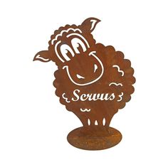 a metal sheep with the word scrums on it's face and nose