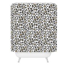 a shower curtain with leopard print on it