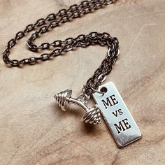 "This necklace features a silver dumbbell charm (perfect for any lady lifter!) as well as a motivational \"Me vs Me\" tag charm. The necklace can be customized with either a ballchain or gunmetal chain, as well as your desired length. If you're not into jewelry, you also have the keychain option! This piece will be personalized just for you! If you have any special requests or customizations, please feel free to message me before ordering.  Stay updated on new products & promotions: Follow my Instagram @Creativia.Handmade Facebook: www.facebook.com/creativiahandmade" Me Vs Me, Quotes Gym, Crossfit Weightlifting, Old Key, Motivation Fitness, Girls Who Lift, Fitness Inspo, Weight Lifting, Crossfit