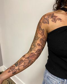 a woman with a tattoo on her arm