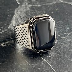 Mens Black Onyx Stone Ring , Natural Black Onyx Gemstone Ring , Square Black Ring , Signet Ring , Hand Engraved Silver Ring , Gift For Him , Same Day For Shipping ✧ Product Details * Handmade İtem * Gender : Male / Female * Material : 925K Sterling Silver * Ring Weight : 8.5 Grams * Gemstone Type : Black Onyx ✔ Usage Details * Silver jewelry is very sensitive to chemicals. It is recommended to keep away from chemical substances such as cream, bleach, deodorant, detergent. * Silver jewelry can also darken quickly in salt water, that is, in sea water. For this reason, it is best to remove them when swimming in the sea. ✔ Shipping * Your orders placed on weekdays are delivered to the cargo on the same day. Your orders placed on the weekend are delivered to the cargo on Monday. ✔ Other Details Rectangular Black Metal Jewelry, Black Rectangular Rings For Gifts, Black Rectangular Ring Gift, Black Metal Rings For Gifts, Black Metal Rings For Gift, Black Polished Metal Jewelry, Classic Black Adjustable Signet Ring, Black Jewelry With Stone Setting For Gift, Elegant Black Jewelry With Stone Setting