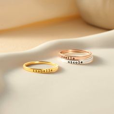 "These stacking name rings are great ways to wear children's names. A great gift for any occasion  ► DAINTY STACKING NAME RING * Character limits: 10 characters. * By default, silver items comes with BLACK engraving and gold-plated item comes with CLEAR engraving * All of our jewelry are handmade from scratch and packaged with care in our workshop ► HOW TO ORDER & ADD PERSONALIZATION - Select your preferred color and size ring from the menu. - Include in the \"Add your personalization\" box the pet's name. Please write them in the exact way (lowercase or uppercase) you want. Ex: LOU or lou or LoU - Add the item to cart and check out. - If you forget leave such note during check out, you can send us a message with your instructions by clicking \"Contact Shop Owner\" button on the shop home Mom Rings Stackable, Mom Rings, Mothers Day Rings, Mothers Ring, Mom Ring, Silver Items, Name Ring, Mother Rings, Name Rings