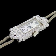 Art Deco Platinum Evening Watches, Platinum Art Deco Evening Watches, Antique Platinum Evening Watches, Antique Platinum Jewelry And Watches For Evening, Luxury Hallmarked Diamond Watch For Evening, Luxury Hallmarked Diamond Watch For Evenings, Platinum Diamond Watch With 17 Jewels For Evening, Art Deco Rectangular Watch With Diamond Hour Markers, Art Deco Diamond Watch For Evening