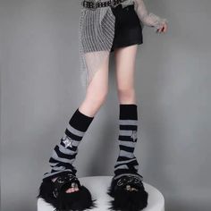 𝔇𝔢𝔱𝔞𝔦𝔩𝔰: Style: Kawaii Goth, Alt, Grunge Materials: Acrylic Quantity: 1 pair This leg warmer is the perfect accessory to help you add a little extra warmth and style to your outfit. With a striped design and sequin star pattern, this leg warmer is available in multiple colors to help you match any outfit. Enjoy free shipping with a purchase of over 80$ Striped Leg Warmers Outfit, Harajuku Style Black Leg Warmers For Winter, Black Leg Warmers For Festival, Alternative Style Black Leg Warmers For Winter, Trendy Winter Leg Warmers For Cosplay, Black Edgy Leg Warmers For Cosplay, Black Harajuku Leg Warmers For Fall, Edgy Black Leg Warmers For Cosplay, Black Fitted Harajuku Leg Warmers