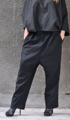 "This FABULOUS Black Linen Pants with side pockets will be your \"Must have \" garment for the new season... So comfy and easy to wear at the same time a touch of elegance and style... Wear it with extravagant tunic, sneakers, wedges , favorite tee or top, or hoodie or sweater....or what else do you have in mind will be always just PERFECT... Made of : 100% Linen The model wears size M - 5,6' / 170 cm Available Size: XS, S, M, L, XL, 2XL,3XL,4XL If you have any questions about the item, our poli Linen Pants With Pockets, Linen Trousers With Pockets, Straight Linen Pants With Pockets, Linen Harem Pants With Pockets Straight Leg, Linen Trousers With Relaxed Fit, Baggy Linen Pants With Tapered Leg, Black Linen Ankle-length Bottoms, Black Linen Ankle-length Pants, Black Linen Tapered Leg Bottoms