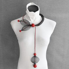 Extravagant long black necklace, Artistic necklace, Fashion necklace, Contemporary necklace, Necklace with extension, Avant-garde collar... Long artistic extravagant necklace. Contemporary fashion necklace for lovers of unique stylish expression. Necklace is in combination of acrylic components and nylon mash. Necklace is on memory and adapts to neck size you can also lock it on position with magnetic lock. Dimension and description: - Necklace size around neck is: 20"/ 50 cm. - Necklace length with extension is about: 20" /50 cm - Necklace locking is magnetic. Please send me a message if you have any questions or doubts. I will gladly answer to you. Search out my shop maybe you will find something for your loved ones or for you. Best regards Ivana. Elegant Black Lariat Beaded Necklace, Adjustable Long Necklace For Evening, Modern Long Necklace For Evening, Elegant Black Lariat Long Necklace, Black Necklaces With Unique Variations As Gifts, Black Necklace With Unique Variations For Gift, Unique Black Beads Necklace For Party, Black Lariat Long Necklace Gift, Black Lariat Long Necklace For Gift