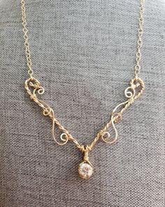 Stones: approx. 8 mm Moissanite Metal : 14K Gold Filled 19 inches approx. (Adjustable) Wire Wrapped Donut, Wire Wrapped Pendant Stones, Wire Necklace Ideas, Mermaid Trinkets, Wire Necklace Diy, Wire Jewelry Necklaces, Paperclip Art, Wire Necklaces, Copper Wire Art