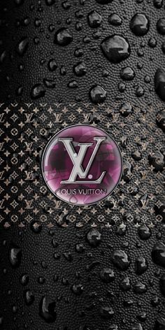 the louis vuitton logo is displayed on a black leather background with water droplets