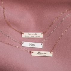 "A Personalized Mama Necklace for the woman who always gives and loves unconditionally. Our Personalized Mama Bar Necklace is the perfect way to show any special mother how much you care! This dainty necklace can be personalized with any mom name, in addition to a special quote or message, date, kids names, and more, making it a truly unique and special gift. Create a one-of-a-kind piece she'll love. A thoughtful and precious keepsake that's sure to become part of Mama's everyday jewelry collection, Give her something truly special that allows her to cherish her babies wherever she goes! Designed with warmth and personal touches in mind - just like the relationship between Mom and her kiddos! Let Mom know how much you care in a unique way that stands out. Melanie Golden Jewelry's Engraved Mother's Day Gift Rectangular Pendant Necklace For Mom, Personalized Bar Necklace As Gift, Minimalist Bar Necklace For Mother's Day Personalized Gift, Meaningful Charm Necklaces For Mom As Gift, Rose Gold Charm Necklace With Name For Mom, Rose Gold Name Charm Necklaces For Mom, Personalized Silver Bar Necklace, Personalized Rose Gold Bar Necklace For Gift, Meaningful Charm Necklace For Mom