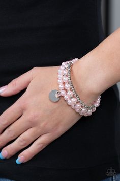 Pink pearls, glistening silver beads, and an iridescent rhinestone are threaded along elastic stretchy bands, creating refined layers across the wrist.

 Sold as one set of three bracelets. Pink Pearl Bracelet, Pink Pearls, Iridescent Crystal, Paparazzi Accessories, Latest Jewellery, Silver Accessories, Paparazzi Jewelry, Elegant Accessories, Pink Bracelet