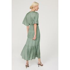 Green satin (100% Polyester). A-line. Short sleeves. V-neck. Pull on. 54" from shoulder to hemline. Imported. Spring Satin A-line Midi Dress, Elegant V-neck Dress With Flowy Skirt, Silk V-neck Midi Dress With Ruffles, Spring V-neck Rayon Dress With Short Sleeves, Rayon A-line Maxi Dress, Flowy A-line Dress For Brunch, Flowy A-line Brunch Dress, Satin V-neck Maxi Dress For Brunch, Solid Color Maxi Dress With Surplice Neckline For Spring