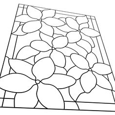 a stained glass window with leaves and flowers on the bottom, in black and white