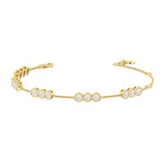 Round out your everyday style with the sparkle of this diamond bracelet. You can wear it on its own or stack it with a timepiece or a couple of bangles. This bracelet is designed to withstand frequent use. It features a series of diamond trios set securely on bezels. The bezel setting ensures the diamond stays firmly in place and its sides are protected from impact. Stackable Diamond Bracelet, Timeless Stackable Cubic Zirconia Diamond Bracelet, Luxury Tennis Bracelet With Bezel Setting, Diamond White Diamond Bracelets With Bezel Setting, Elegant Diamond White Bracelet With Bezel Setting, Timeless Stackable Diamond Tennis Bracelet, Timeless Diamond Stackable Tennis Bracelet, Timeless Diamond Tennis Bracelet Stackable, Modern Round Diamond Bracelet With Bezel Setting