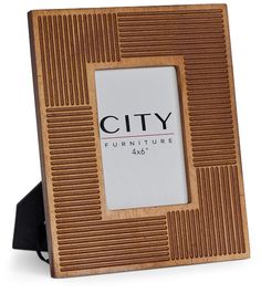 a wooden frame with the city furniture logo on it's front and bottom corner