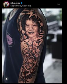 a man with a tattoo on his arm that has an image of a woman and flowers