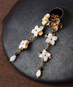 Chic White Shell Flower 14K Gold Drop EarringsMade of fine 14K Gold.Measurement: 6.2cm/2.418" * 1cm/0.39". Matches easily with daily hairstyle, dresses & Shirts Elegant Dangle Clip-on Flower Earrings, Elegant Clip-on Dangle Flower Earrings, Elegant Rose Gold Flower Clip-on Earrings, Elegant Clip-on Drop Flower Earrings, White Clip-on Flower Earrings, Elegant Floral Clip-on Earrings For Formal Occasions, White Flower Clip-on Earrings, Formal White Clip-on Flower Earrings, White Flower Shaped Clip-on Earrings For Formal Events