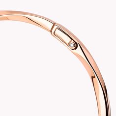 Sleek and stackable, this dynamic, twisting rose gold Spiral bangle performs playful pirouettes as it swirls elegantly around the wrist. Delicate enough to wear every day, wear it alone or pair with other Spiral bangles, amplifying the impact of these eternally modern jewels. The Spiral collection features delicate gold and pavé diamond jewels that are designed to be stacked and mixed and matched, alongside a range of captivating timepieces. A charming Spiral rose gold bangle featuring a total w Modern Rose Gold Bangle, Modern Rose Gold Round Bangle, Modern Twist Bangle With Polished Finish, Elegant Rose Gold Bangle With Polished Finish, Elegant Polished Rose Gold Bangle, Diamond Shaped Engagement Ring, Graff Diamonds, Rose Gold Bangle, The Spiral