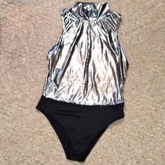 Nwot Questions? Leave A Comment Below! Silver Shiny Stretch Bodysuit, Silver Sleeveless Bodysuit For Party, Silver Fitted Bodysuit For Summer, Silver Sleeveless Party Bodysuit, Fitted Silver Bodysuit For Summer, Silver Bodysuit For Night Out In Summer, Summer Club Bodysuit In Silver, Metallic Shiny Bodysuit For Night Out, Silver Bodysuit For Summer Parties