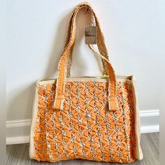 New With Tags Attached Orange And Tan Shoulder Bag. Great For Summer Or Beach Trip. Fabric Is Woven And Crocheted. Coastal, Sea Side, Bohemian, Minimalist Style. Brand: Magid Condition: New With Tags, Sides Folded In Due To Storage (Bag Is As Pictured) Thank You For Shopping Sustainably! Bundle For Extra Savings. Smoke Free, Feline Friendly Home. Fast Shipping. Brown Woven Leather Beach Bag For Spring, Orange Square Bag For Vacation, Square Orange Bag For Vacation, Orange Square Vacation Bag, Rectangular Tan Shoulder Bag For Beach, Casual Orange Crochet Bag For Vacation, Casual Orange Crochet Bag For Everyday, Tan Straw Bag For Everyday Summer Use, Summer Tan Straw Bag With Braided Handles