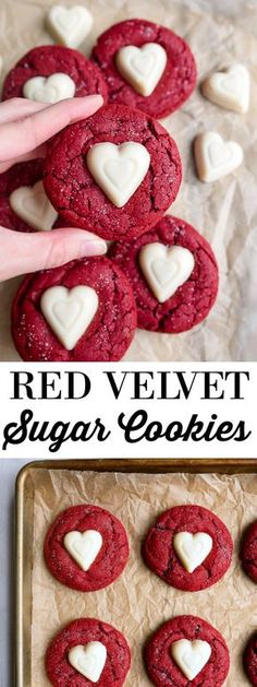 red velvet sugar cookies with white hearts on top and in the middle, one cookie has been cut into heart shapes