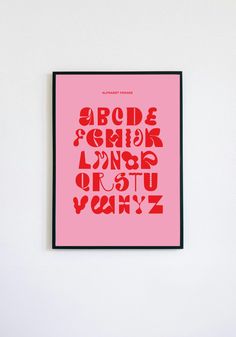 a pink poster hanging on the wall with red letters in different languages and numbers below it