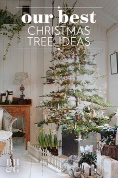 a christmas tree in a living room next to a fireplace with the words our best christmas tree ideas on it