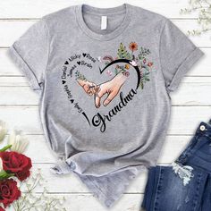 Personalized Grandma With Grandkids Flower Heart T-Shirt Great as Birthday gifts or Holiday presents. This adorable item can be designed upon anyone's wish with any title. Please enter: Nickname. ex. Grandma, Nana, Mimi, ...etc. Kids' Names wanted on the shirt (Names separated by commas) All items are made to order. * Please be aware that the physical product's colors may differ slightly from the mockup. Product Details Brand: Gildan Classic unisex cut makes this easy to fit the body. Material: Grandma With Grandkids, Grandma Tshirt, Funny Grandma Shirts, Grandma Shirt, New Grandma, Personalized Grandma, Grandma Shirts, Heart T Shirt, Personalized Gifts For Mom