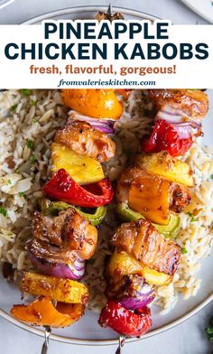 pineapple chicken kabobs on skewers over rice