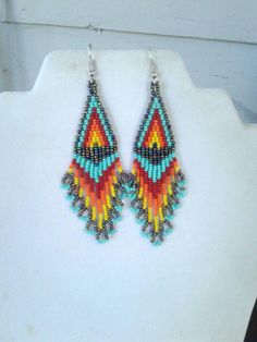 Native American Beaded Flame Earrings Turquoise and Peacock Red, Orange, Yellow Southwestern, Boho, Flame Earrings, Stitch Earrings, Southwestern Boho, Brick Stitch Earrings, Beautiful Beadwork, Native American Style, Thread Earrings, Earrings Turquoise, Native American Beading