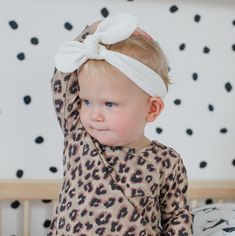 Each stylish Cream baby and toddler headband is hand crafted from the highest quality stretch Cotton Jersey fabric. The fabric is wonderfully soft and stretchy perfectly comfortable for delicate skin and hair. Featuring a tie centre design, you can easily un tie and adjust to suit your baby's style.  All headbands will arrive on a display card. Please use the size guide below when ordering.  0-3m 13" 3-6m 14" 6-9m 15" 9-12m 16" 1-2y 17" 2+y 18" Milk Teeth Clothing is a British based children's c Milk Teeth, Headband Bows, Knotted Baby Headband, Infant Headband, Toddler Headband, Stylish Headbands, Baby Head Wrap, Baby Girl Headband, Toddler Headbands