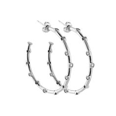 Expertly crafted with stunning crystal accents, the Coast Hoop Earrings are the perfect addition to any jewelry collection. Sleek and elegant, these earrings add a touch of sophistication to any outfit. With their eye-catching design, they are sure to make you stand out in any crowd. Lead & Nickle Free Please be aware that due to the unique and handmade nature of each product, colors, shapes, and sizes may vary slightly from the photos and descriptions. Modern Small Hoop Cubic Zirconia Earrings, Modern Cubic Zirconia Small Hoop Earrings, Elegant Small Hoop Silver Crystal Earrings, Elegant Silver Small Hoop Crystal Earrings, Elegant Crystal Hoop Earrings, Elegant Sterling Silver Hoop Crystal Earrings, Elegant Small Hoop Crystal Earrings, Elegant Pierced Crystal Hoop Earrings, Elegant Pierced Hoop Crystal Earrings